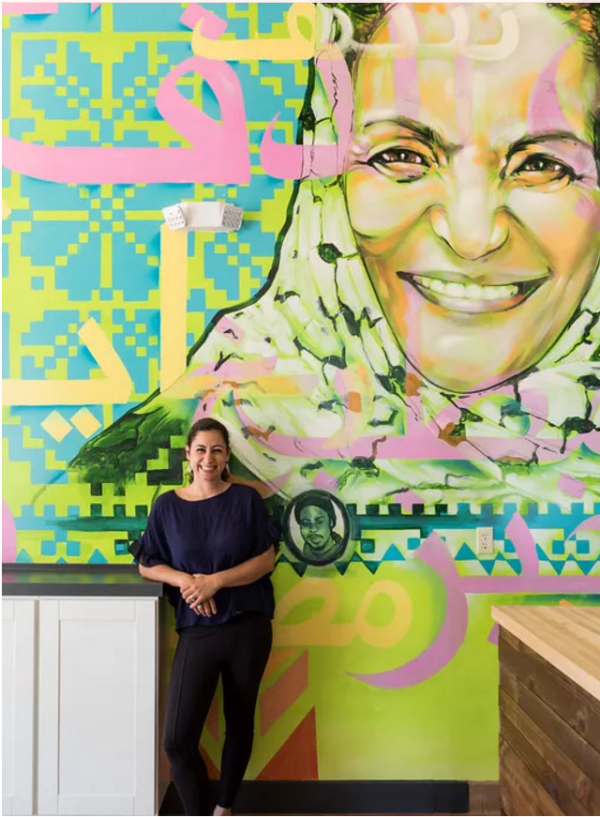 Reem-Assil-in-front-of-her-mural-SF-Eater-e1501265364546.png