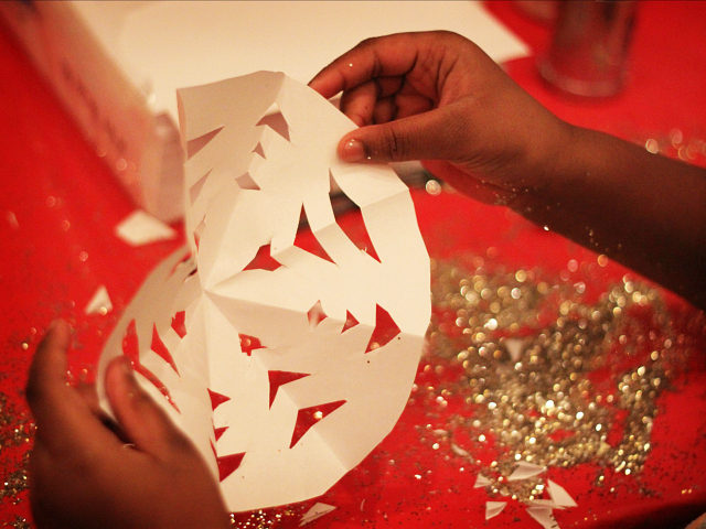 child-plays-with-craft-glitter-snowflakes-flickr-640x480.jpg
