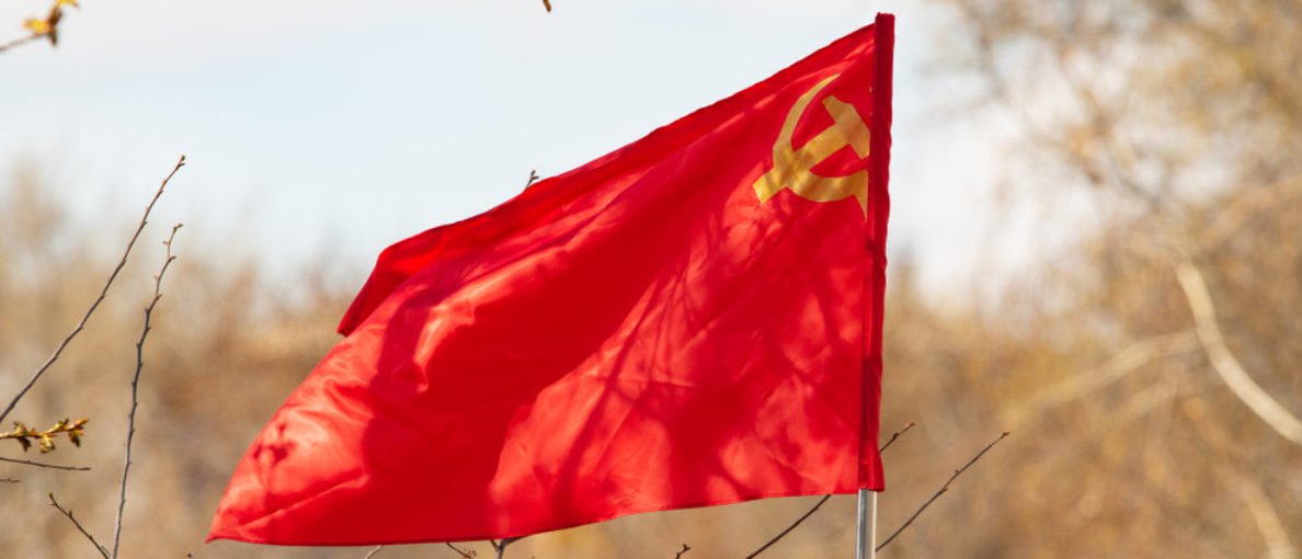 Communist_Flag_Sickle_Hammer-e1526074991621.jpg